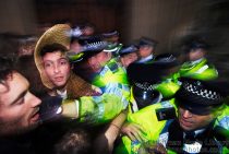 Climate Rush demo, organised by anti-airport expansion campaigners. Hundreds of activists chanting "Words not deeds" stormed Parliament to demand urgent action on the environment. The protest was timed to coincide with the 100th anniversary of the Suffragettes’ rush on Parliament to demand the right to vote.