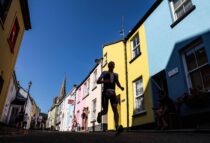 PEMBROKE, WALES - SEPTEMBER 3:  Athletes compete in the run section of Ironman Wales on September 3, 2023 in Pembroke, Wales.Ironman is a World wide triathlon series created in Hawaii in the 70's consisting of a 2.4 miles swim, 112 mile bike race and 26.2 miles run.