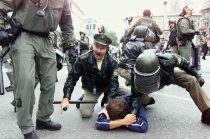 An England fan is arrested before England v Germany game in Munich
