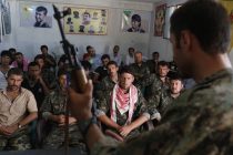 Civilians who fled their homes in Sinjar after the town was captured by the Islamic State are taught how to assemble an AK-47 rifle by Kurdish PYG fighters at a training camp in the autonomous Kurdish region of northern Syria on August 15, 2014. 
The PYG hope that training the displaced Sinjaris will allow them to keep hold of the strategic Mt Sinjar, and possibly allow them to retake their homes.
[Sam Tarling for The Telegraph]