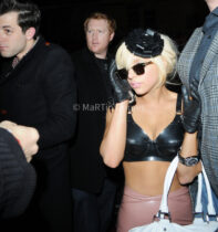 Lady Gaga is accompanied by bodyguards in a night out in London