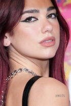 Dua Lipa poses as she arrives for the BRIT Awards at the O2 Arena in London, Britain, March 2, 2024