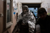 Wounded soldiers are treated inside a frontline stabilisation point after being evacuated from positions near the front line. The images are part of Valhalla Express, a series documenting frontline medical care and evacuation.