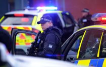 Armed police at Preston Crown Court for trial of Dale Cregan and nine others in connection with three murders