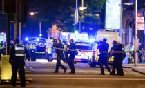 03/06/2017. London, UK.  Armed police approach a building with caution  following reports of a vehicle being deliberately driven at pedestrians crossing London Bridge.