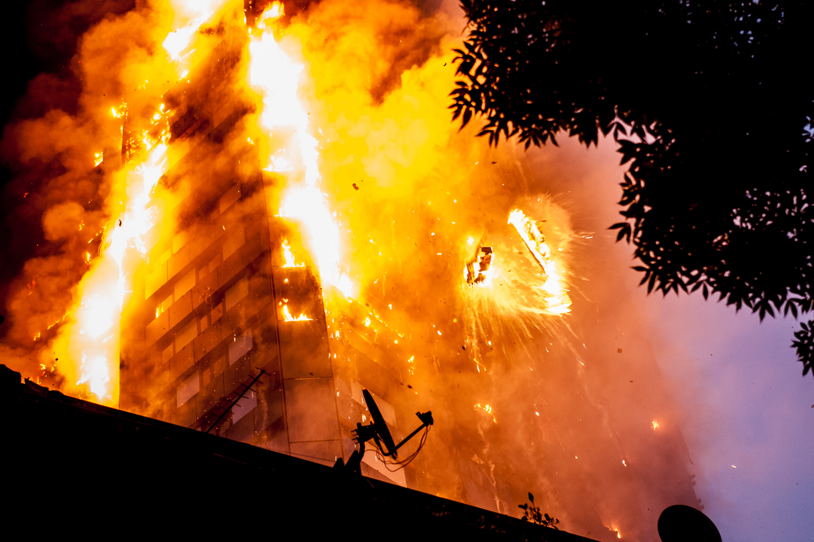 14/06/2017. London, UK. The scene of a huge fire at Grenfell tower block in White City near Notting Hill, London. The blaze engulfed the 24-storey building (containing 120 apartments) with 200 firefighters and 40 fire engines attending the scene. There were reports of people trapped in the building, many not finding a way out. London Fire Brigade declared it a major incident and unprecedented in modern times.
