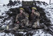 Ukrainian soldiers in their foxhole defending the north of the city of Kharkiv on the second day of the war. 25 February 2022. EDITORS NOTE: This image can only be used in connection with Assignments 2023 - The BPPA Exhibition.