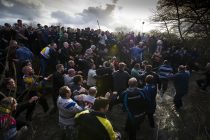 04/03/2014. Ashbourne, UK.  Shops in the Town of Ashbourne boarded up ahead of the game. The Up'Ards and the Down'Ards, fight for the ball during the second day of the Royal Shrovetide Football match in Ashbourne, Derbyshire. For two days, over Shrove Tuesday and Ash Wednesday, hundreds of participants battle it out in a 'no rules' game dating back to the 17th Century where the aim is to get a ball into one of two goals that are positioned three miles apart at either end of Ashboune. Photo credit: Ben Cawthra