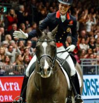 Charlotte Du Jardin(GBR) riding Valegro wins the REEM ACRA World Cup Dressage leg - Grand Prix Freestyle and breaks the world record in the process on day two of the London International Horse Show at Olympia, London. 17/12/2013