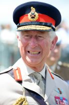The Prince of Wales and the Duchess of Cornwall with veterans and serving soldiers at 3rd Glider monument at Pegasus Bridge Normandy at the D Day 70 celebrationsThe Prince of Wales and the Duchess of Cornwall with veterans and serving soldiers at 3rd Glider monument at Pegasus Bridge Normandy at the D Day 70 celebrations
