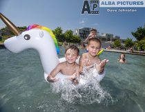 Alfie Hunter (5) and Solo Blyth (5) both from Edinburgh and Steven Hunter (9) have fun in the ponds outside the Scottish Parliament, on what is predicted to be the hottest day of the year.
© Dave Johnston / EEm