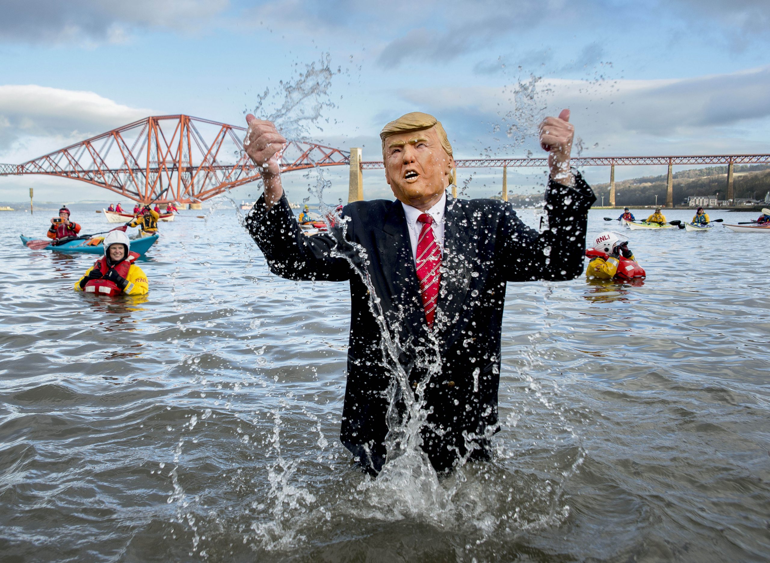 Thousands of people, many in fancy dress, took part in the annual Loony Dook New Years swim in the Firth of Forth at Queensferry in the shadow of the iconic Forth Bridges today.
© Dave Johnston / EEm