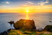 Sunrise over Dunnottar Castle in Scotland