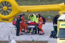 ****MINIMUM FEE OF £500 FOR SET OF PICS IF USED*****
***Air ambulance parked on helipad surrounded by public road and public footpath.Members of the public were also taking pictures.***
Picture shows Prince William helping to transfer a patient from the air ambulance onto another stretcher in Cambridge on March 22.
Extraordinary pictures have been revealed showing the caring side of Prince William as he went above and beyond the call of duty at work, comforting a patient and even travelling with him in the ambulance.
Photos show the Duke of Cambridge reassuring and comforting a patient after flying him to hospital in the air ambulance yesterday afternoon (Tues).
As co-pilot William is usually seen waiting in the helicopter cock-pit while his colleagues carry out the medical tasks.
But this time it was the Duke who was the first to jump out of the helicopter and pull the patient out on a stretcher.
SEE COPY CATCHLINE Prince Will helps patient at hospital.