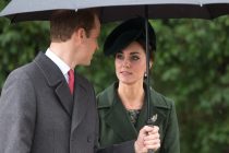 PIC BY GEOFF ROBINSON PHOTOGRAPHY 07976 880732.
Pic shows The Duke and Duchess of Cambridge at Sandringham Church on December 25, 2015 in King's Lynn, Norfolk, for the Christmas Day Service.
Members of the Royal Family have attended the Christmas Day service at church on the Sandringham estate.
Led by the Queen, who arrived in a Bentley, the royals made their way from Sandringham House to St Mary Magdalene Church for the traditional service.
The other members of the family made the short journey on foot.
Hundreds of well-wishers had gathered in the rain to catch a glimpse of the monarch and other senior members of the Royal Family.
The Queen, who arrived in Norfolk by train last week, wore a red coat and hat with fur trim, and held a matching umbrella.
She returned to Sandringham House by car after the service, but Prince Harry was among those who stopped to speak to members of the public.