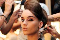A model backstage has her hair done at Somerset House as part of London Fashion Week. PRESS ASSOCIATION Photo. Picture date: Tuesday September 21, 2010. Photo credit should read: Katie Collins/PA Wire