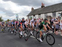 Raiders going through a Essex Village Cycling - 2014 Tour De France - Monday 7th July 2014 - Stage 3 - Cambridge to London. Photo by Kieran Galvin