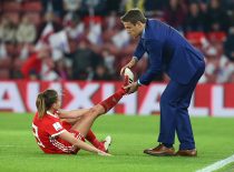 England women's head coach Phil Neville helps Kayleigh Green of Wales Women with cramp during 2019 FIFA Women's World Cup Group 1 qualifier match between England and Wales at St.Mary's, Southampton FC Southampton , England on 06 April 2018. Photo by Kieran Galvin