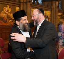 Photo by Howard Barlow  7 June 2015   A warm embrace between Chief Rabbi Ephraim Mirvis and Shaykh Ibrahim Mogra, both keynote speakers at Sunday's 10th Anniversary Dinner of the Greater Manchester Muslim Jewish Forum.