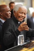 26.2.2012 Nelson Mandela leaving the Dorchester Hotel in London on his way to celebrate his 90th birthday at a special party in Hyde Park.