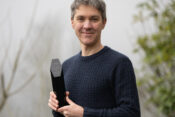 Oli Scarff with the BPPA's 2023 Press Photographer of the Year trophy