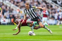 Newcastle Upon Tyne, England, 30th March 2024.  Dan Burn of Newcastle United in action with Mohammed Kudos of West Ham United during the Premier League match at St. James' Park, Newcastle Upon Tyne. Picture credit should read: Nigel Roddis / Sportimage