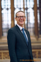 Simon McDonald (Baron McDonald of Salford, GCMG, KCV), former ambassador & head of the Diplomatic Service outside the Divinity Hall before his talk with journalist Nick Higham ‘Leadership: Lessons for Running a Better Government’ at the Sheldonian Theatre. The 2023 FT Weekend Oxford Literary Festival, Oxford, 30 March 2023. Photo © Graham Harrison.