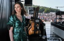 Sophie Ellis-Bextor before going on stage to wow the crowds at Cartmel Racecourse. PICTURES by MILTON HAWORTH. 28TH JUNE 2019.
Notes: I was covering the Cliff Richard Concert at Cartmel. One of the support acts was the lovely Sophie Ellis Bextor who was so relaxed she invited me up onstage with her before she went on. As we chatted at the top of the stairs she just looked back to the dressing rooms. I quickly lifted my camera and captured this shot. It all came together in an instant, the light, the look, the breeze blowing her hair slightly and the crowds waiting to see her. I wish all rock stars and performers were as nice as Sophie. Milton Haworth.