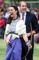 The Duke and Duchess of Cambridge try out the national sport of archery in Thimpu Bhutan