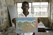 Kabalega Secondary School in Masindi, Western Uganda. Art teacher Moses Ndahuru has been to the UK and learned techniques using chalks and pastels which he has brought back to Uganda and encourages his students to explore challenging subjects such as female circumcision using art. Jangaya Beckham. ©Neil Turner. . 20 April 2005.