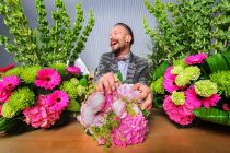 © Licensed to simonjacobs.com. 05/05/2014 London, UK. Royal and celebrity florist Simon Lycett works on designs at his workshop in Camberwell which will be shown in the entrance to the Floral Design Marquee at this year's RHS Chelsea Flower Show. Lycett whose clients include, Elton John, Victoria Beckham and Prince Charles based the design on the logo for this year’s show and includes blooms of, celosia, chrysanthemums, eryngiums, roses, achillea, and hydrangeas. Photo credit : Simon Jacobs