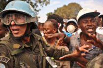 UN troops try to keep order at a food distribution point. Champs de Mars.