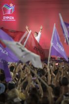 Syntagma Square, Athens, Greece. 18th September, 2015. Several thousand SYRIZA supporters converge on Syntagma Square in the centre of Athens to listen to the party's leader, Alexis Tsipras, and other political leaders before Greece's elections on Sunday. Only around 60 percent of Greeks who voted for SYRIZA in January are saying that they will back the leftists again, according to opinion polls. Pictured: Alexis Tsipras takes to the stage to cheers and flag waving from the crowd. // Lee Thomas, Flat 47a Park East Building, Bow Quarter, London, E3 2UT. Tel. 07784142973. Email: leepthomas@gmail.com. www.leept.co.uk (0000635435)