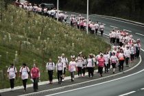 Walk to remember 2017 wends its way down the A590 en route to Furness College. 7th July 2107. MILTON HAWORTH.